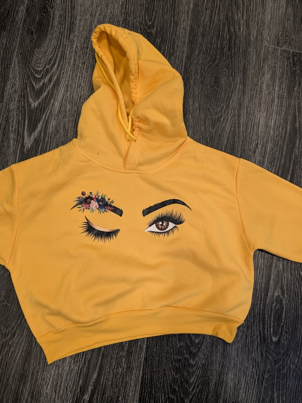 Yellow Eyelash Graphic Cropped Hoodie